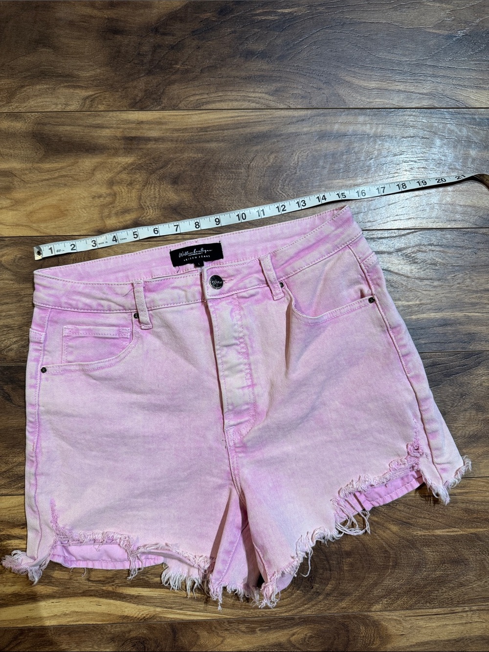 High-Rise Pink Denim Cutoff Shorts with Frayed Hem